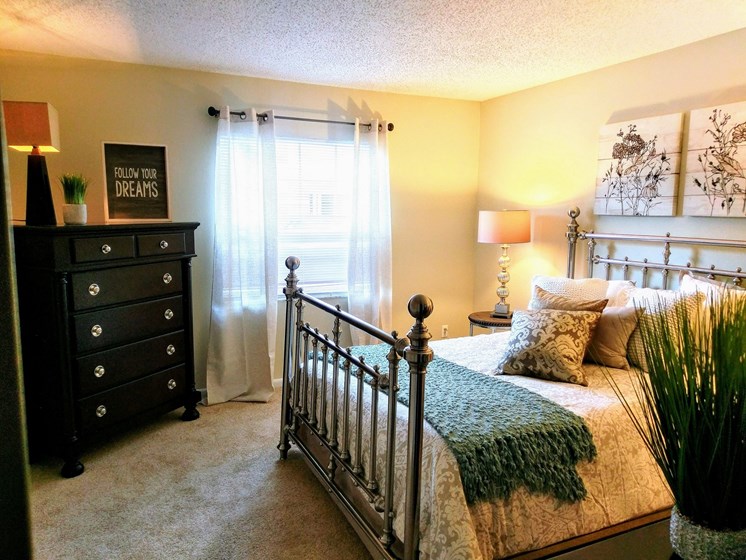 Bedrooms full of natural light that are ready for you at Fountains of Largo, Florida